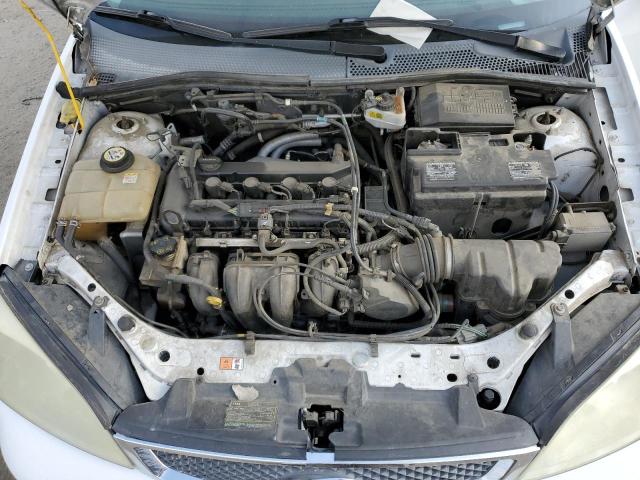 Photo 11 from auction – 2007 FORD FOCUS ZX4 with VIN 1FAHP34N87W243686