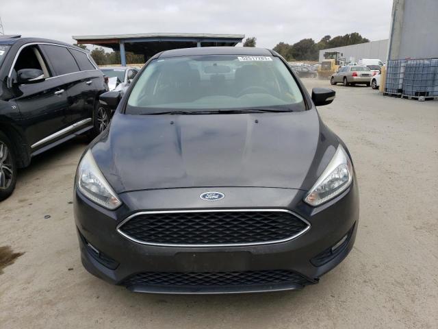 Photo 5 from auction – 2015 FORD FOCUS SE with VIN 1FADP3F28FL358581