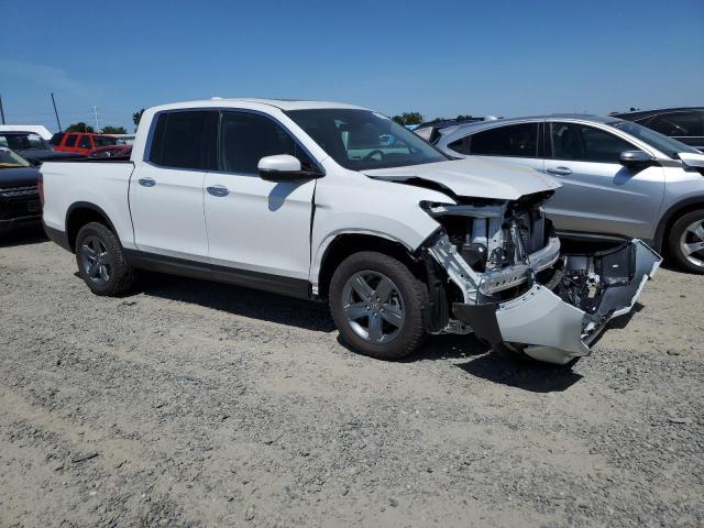 Photo 4 from auction – 2023 HONDA RIDGELINE with VIN 5FPYK3F79PB002013