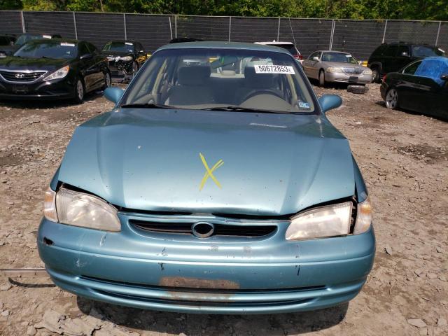 Photo 5 from auction – 1999 TOYOTA COROLLA VE with VIN 2T1BR12E5XC145046