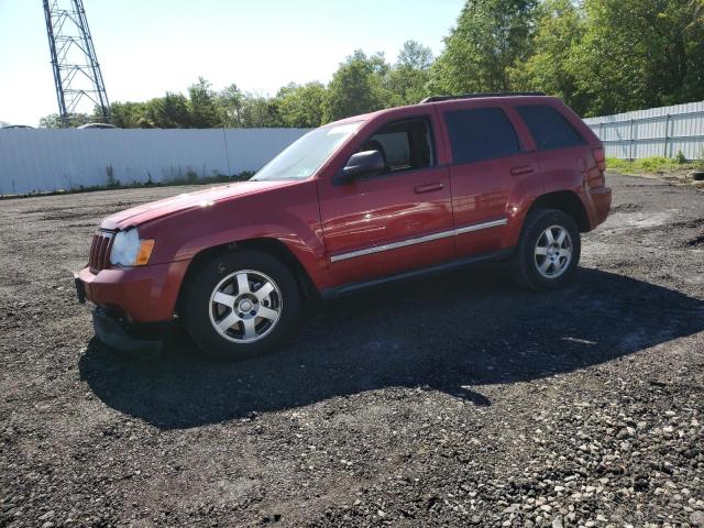JEEP GRAND CHER 2010 with VIN 1J4PR4GK4AC129050 - Photo from auction