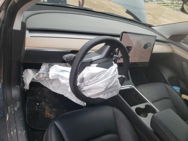 Photo 8 from auction – 2022 TESLA MODEL 3 with VIN 5YJ3E1EB9NF186564
