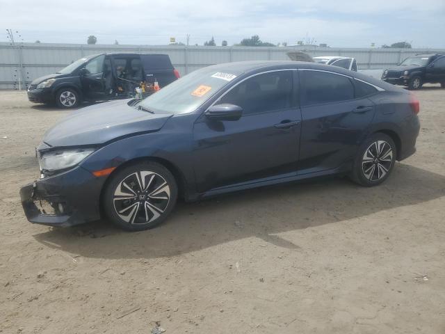 HONDA CIVIC EX 2017 with VIN 2HGFC1E39HH633325 - Photo from auction