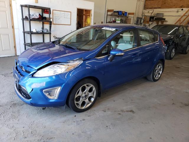 FORD FIESTA SES 2011 with VIN 3FADP4FJ0BM111433 - Photo from auction