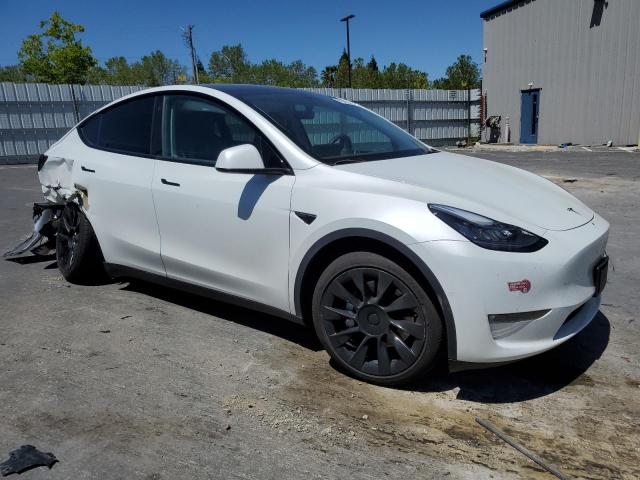 Photo 4 from auction – 2022 TESLA MODEL Y with VIN 7SAYGAEE1NF489173