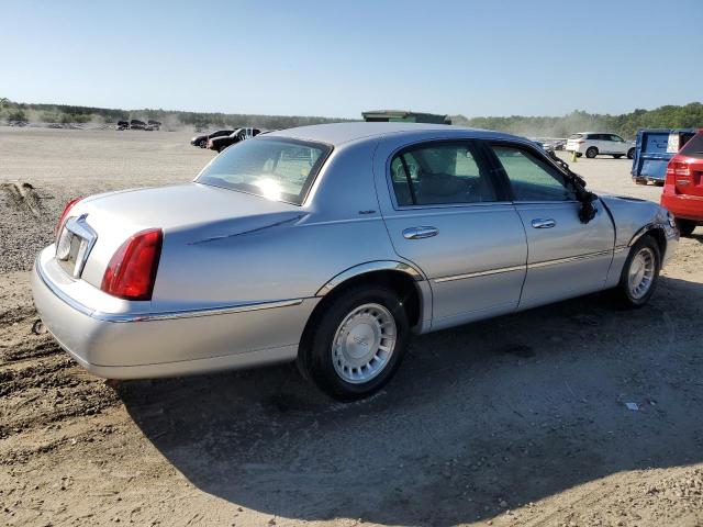 Photo 3 from auction – 2000 LINCOLN TOWN CAR E with VIN 1LNHM81W3YY870584