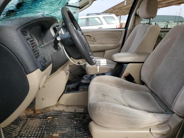 Photo 7 from auction – 2004 MAZDA TRIBUTE LX with VIN 4F2YZ041X4KM04784