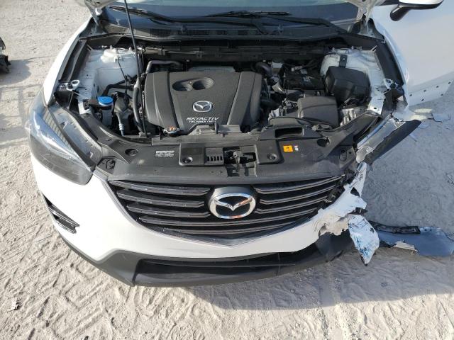 Photo 12 from auction – 2016 MAZDA CX-5 TOURI with VIN JM3KE2CY0G0865785