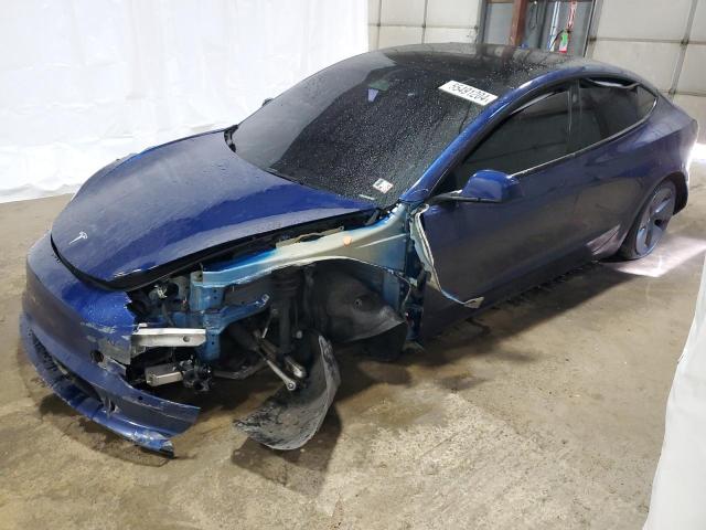 TESLA MODEL 3 2022 with VIN 5YJ3E1EAXNF287586 - Photo from auction
