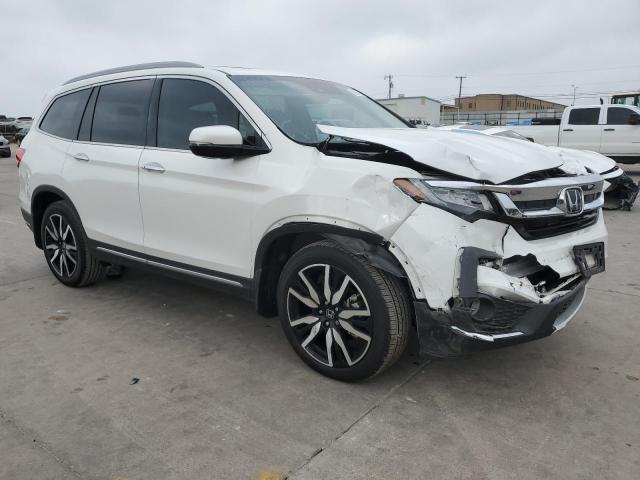 Photo 4 from auction – 2022 HONDA PILOT TOUR with VIN 5FNYF5H69NB016231