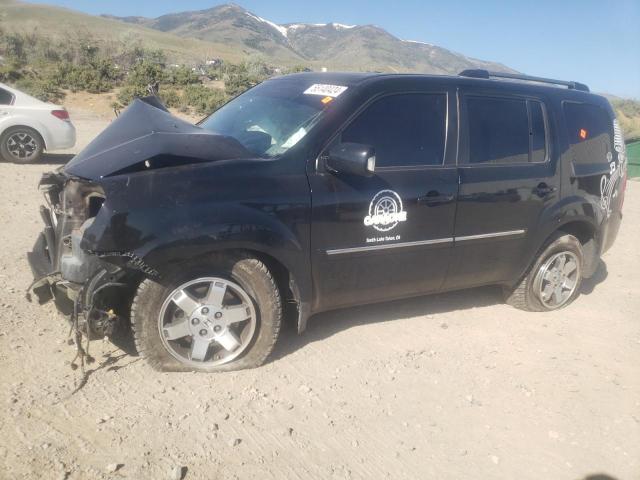 HONDA PILOT TOUR 2010 with VIN 5FNYF4H85AB022520 - Photo from auction