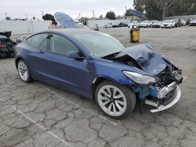 Photo 4 from auction – 2022 TESLA MODEL 3 with VIN 5YJ3E1EAXNF303902