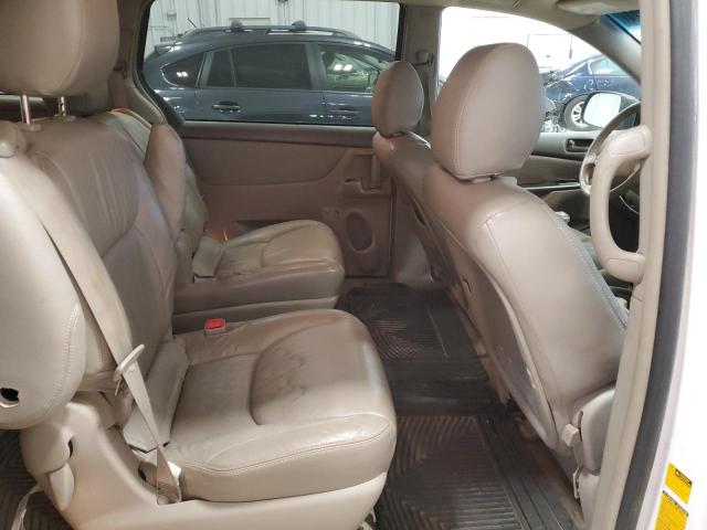 Photo 11 from auction – 2010 TOYOTA SIENNA CE with VIN 5TDKK4CCXAS322403