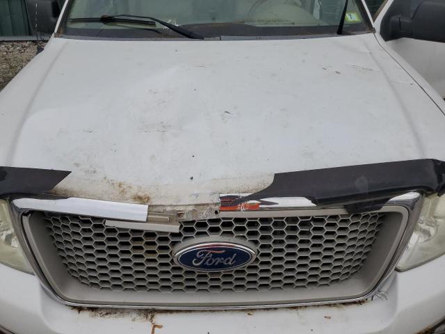 Фото 11 с аукциона – 2004 FORD F150 с VIN 1FTPX14514NC72166
