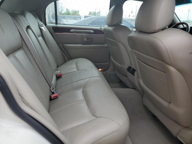Photo 10 from auction – 2004 LINCOLN TOWN CAR U with VIN 1LNHM83W44Y634596