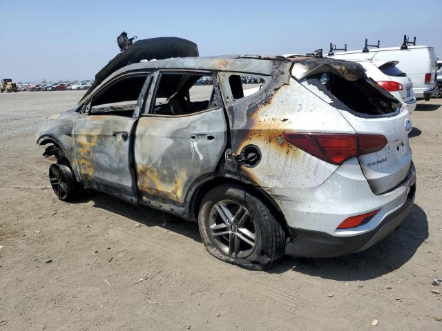 Photo 2 from auction – 2018 HYUNDAI SANTA FE S with VIN 5NMZU3LB6JH057007