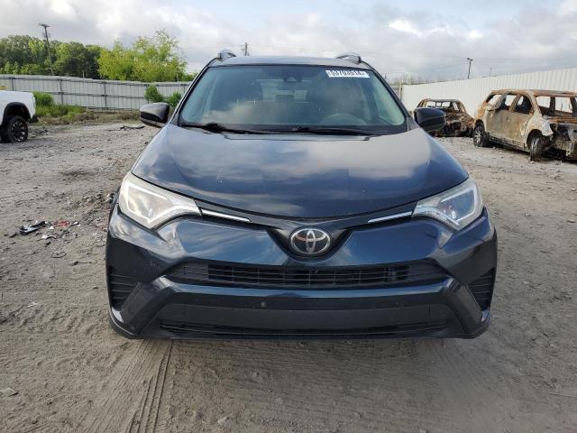 Photo 5 from auction – 2018 TOYOTA RAV4 LE with VIN 2T3ZFREVXJW497571