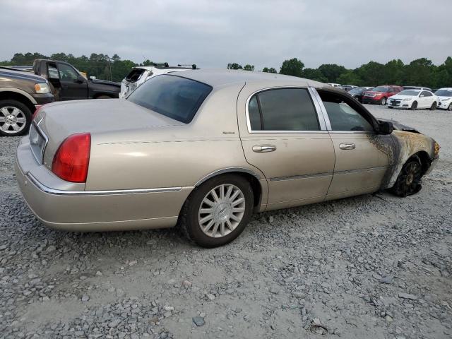 Photo 3 from auction – 2004 LINCOLN TOWN CAR E with VIN 1LNHM81W34Y617727