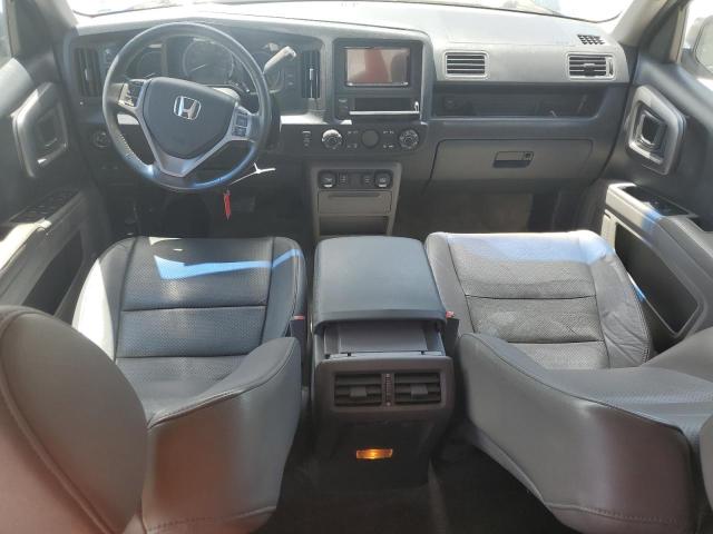 Photo 8 from auction – 2010 HONDA RIDGELINE with VIN 5FPYK1F5XAB001768
