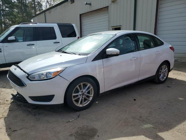 FORD FOCUS SE 2016 with VIN 1FADP3F28GL324772 - Photo from auction