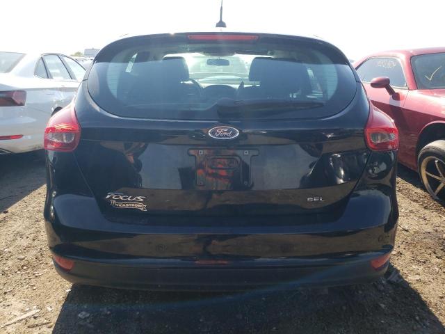 Photo 6 from auction – 2018 FORD FOCUS SEL with VIN 1FADP3M29JL309370