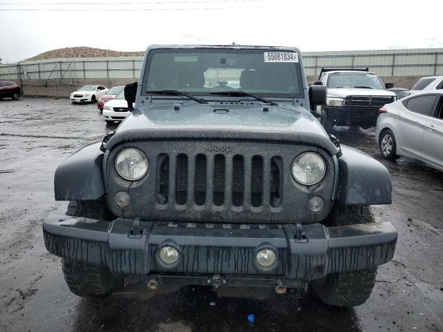 Photo 5 from auction – 2014 JEEP WRANGLER U with VIN 1C4BJWDG8EL309771