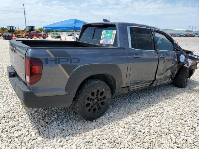 Photo 3 from auction – 2023 HONDA RIDGELINE with VIN 5FPYK3F55PB030101