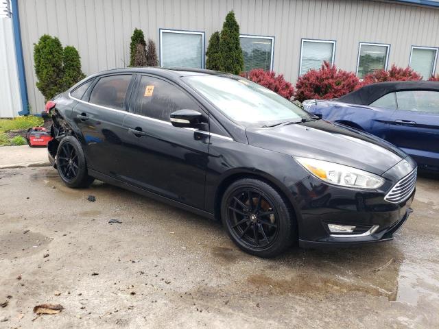 Photo 4 from auction – 2015 FORD FOCUS TITA with VIN 1FADP3J25FL227714