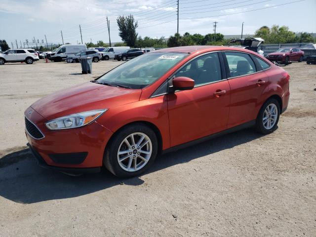 FORD FOCUS SE 2018 with VIN 1FADP3F23JL256288 - Photo from auction