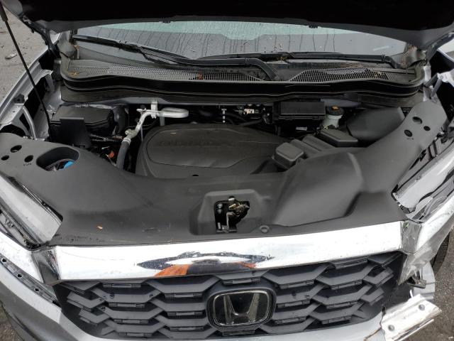 Photo 12 from auction – 2024 HONDA PASSPORT with VIN 5FNYF8H50PB032085