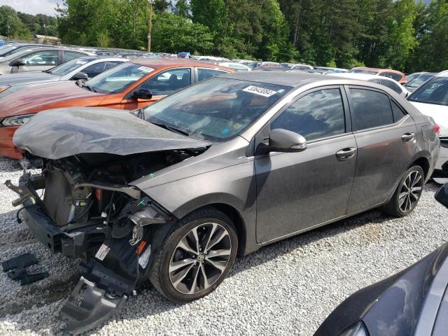 TOYOTA COROLLA L 2019 with VIN 5YFBURHE3KP869296 - Photo from auction