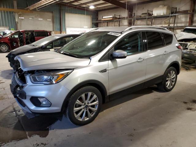 FORD ESCAPE TIT 2017 with VIN 1FMCU0JD2HUC93564 - Photo from auction