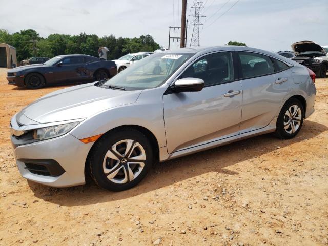 HONDA CIVIC LX 2018 with VIN 19XFC2E58JE020782 - Photo from auction