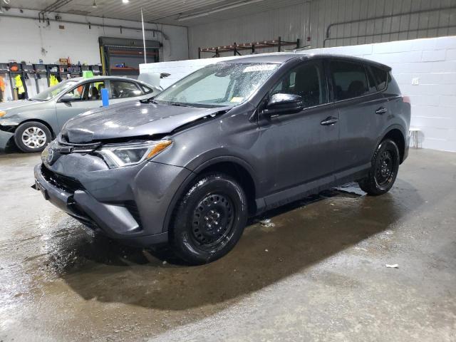 TOYOTA RAV4 LE 2018 with VIN 2T3BFREV5JW849599 - Photo from auction