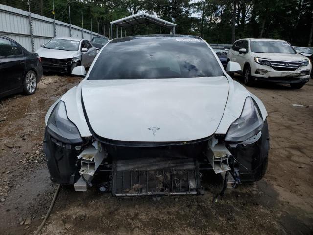 Photo 5 from auction – 2021 TESLA MODEL 3 with VIN 5YJ3E1EA0MF058476