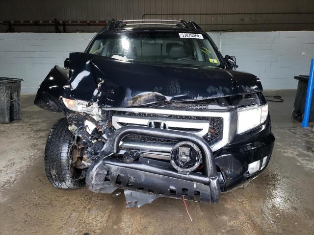 Photo 5 from auction – 2011 HONDA RIDGELINE with VIN 5FPYK1F50BB453827