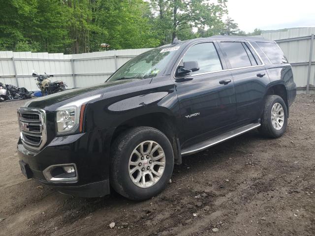 GMC YUKON SLT 2018 with VIN 1GKS2BKC8JR385153 - Photo from auction