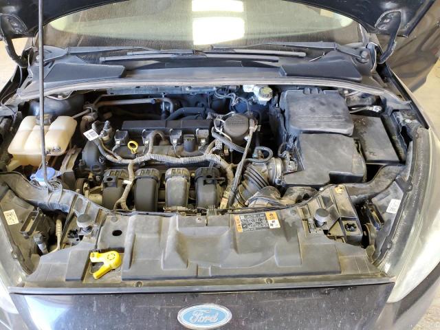 Photo 11 from auction – 2015 FORD FOCUS SE with VIN 1FADP3F25FL318538