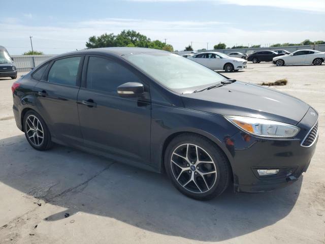 Photo 4 from auction – 2016 FORD FOCUS SE with VIN 1FADP3F25GL258133