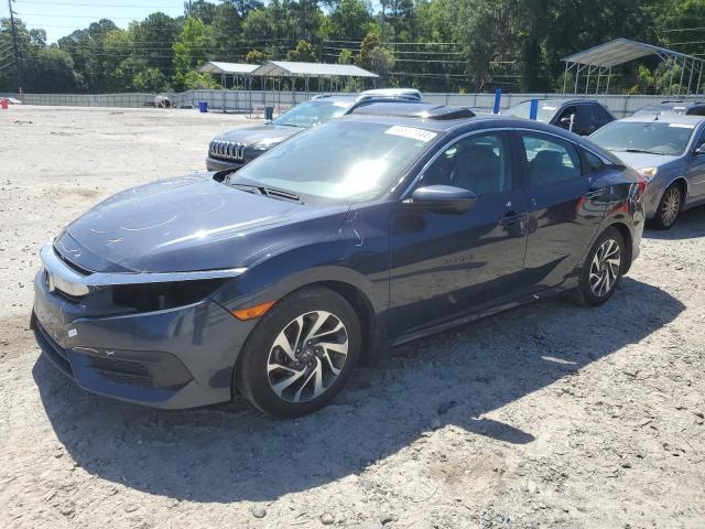 HONDA CIVIC EX 2018 with VIN 19XFC2F75JE012090 - Photo from auction
