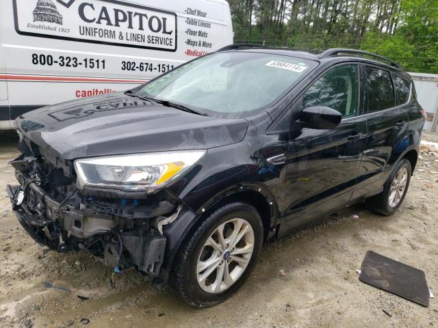FORD ESCAPE SE 2018 with VIN 1FMCU0GD2JUB34363 - Photo from auction