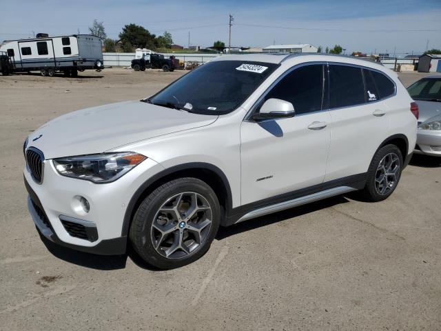 BMW X1 XDRIVE2 2017 with VIN WBXHT3C33H5F84285 - Photo from auction