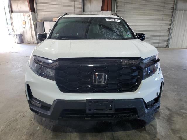 Photo 5 from auction – 2023 HONDA PASSPORT E with VIN 5FNYF8H09PB010588