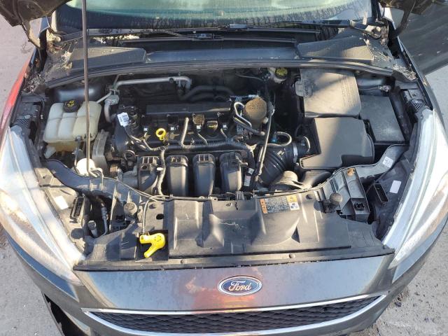 Photo 11 from auction – 2015 FORD FOCUS S with VIN 1FADP3E25FL217808