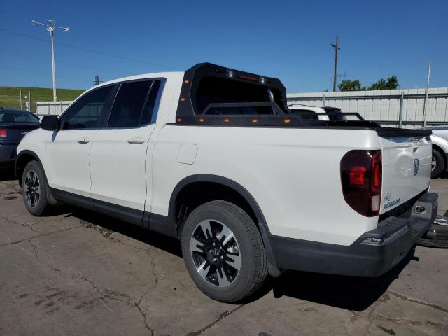Photo 2 from auction – 2020 HONDA RIDGELINE with VIN 5FPYK3F58LB030409