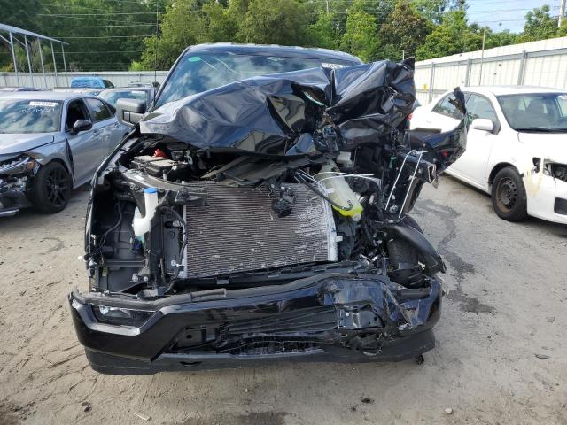 Photo 5 from auction – 2023 FORD F150 SUPER with VIN 1FTFW1E55PFC13018