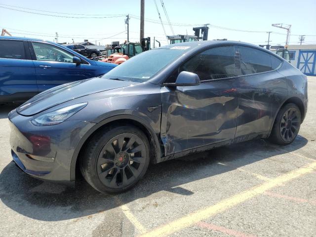 TESLA MODEL Y 2022 with VIN 7SAYGDEE2NF386572 - Photo from auction