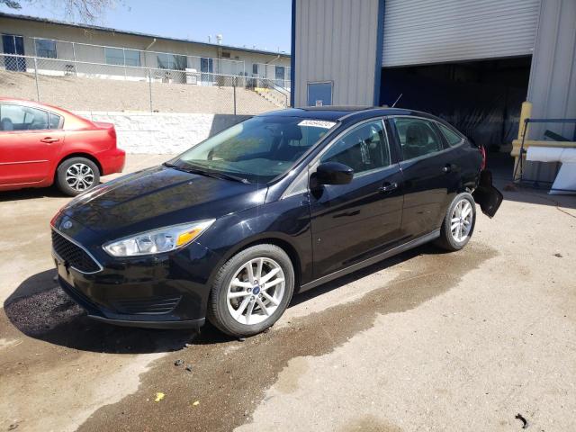 FORD FOCUS SE 2018 with VIN 1FADP3F29JL260975 - Photo from auction