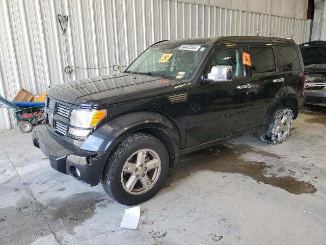DODGE NITRO SXT 2011 with VIN 1D4PU5GK4BW568231 - Photo from auction