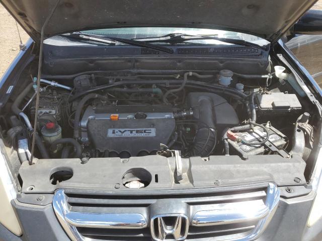 Photo 11 from auction – 2004 HONDA CR-V EX with VIN JHLRD77854C041666